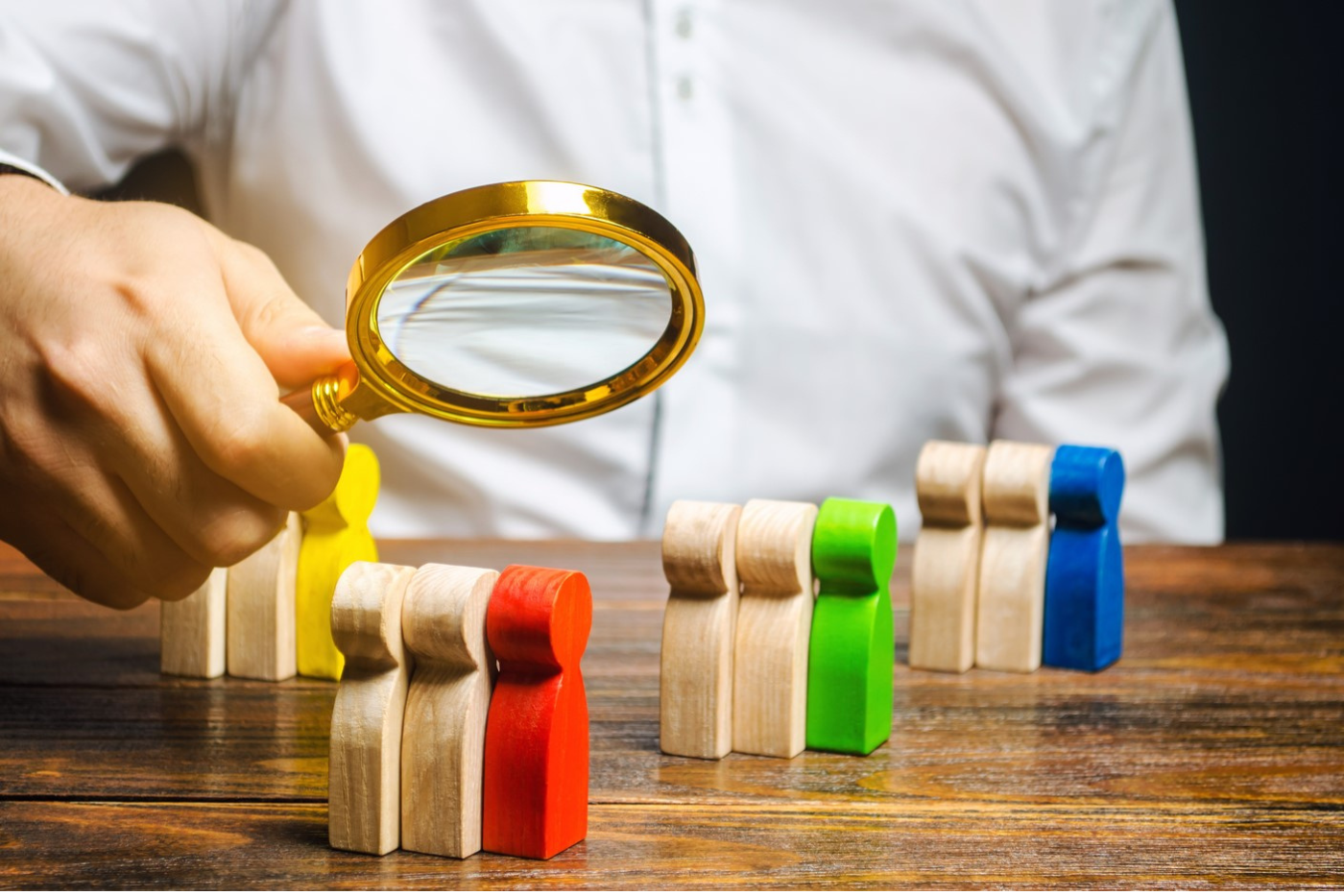 Magnifying glass over a business document representing market research and analysis