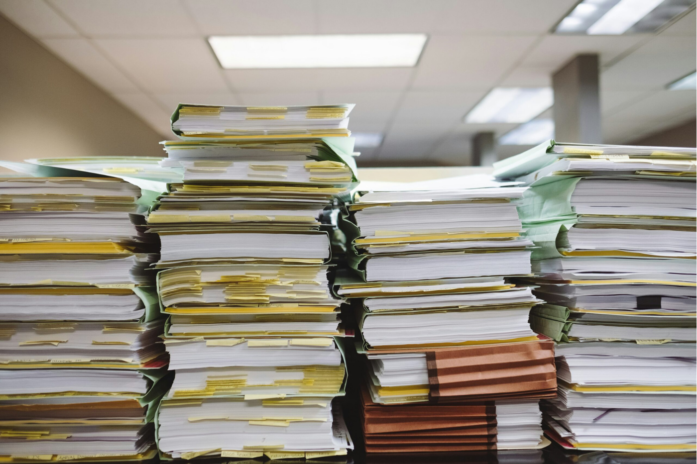 Stack of logistics and shipping paperwork required for Vietnam import/export